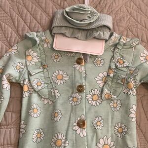 Green daisy baby romper
